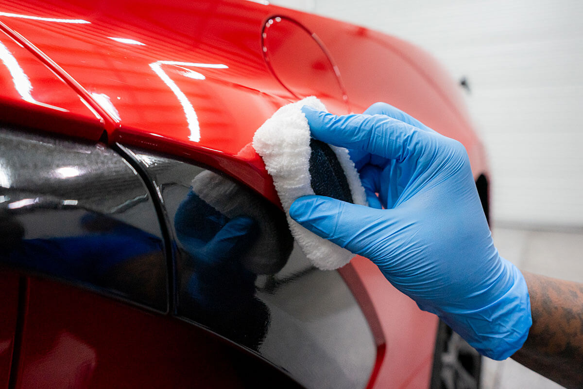 Water beading dramatically on a multi-year 3M ceramic coated car hood after install at Polar Tint Henderson